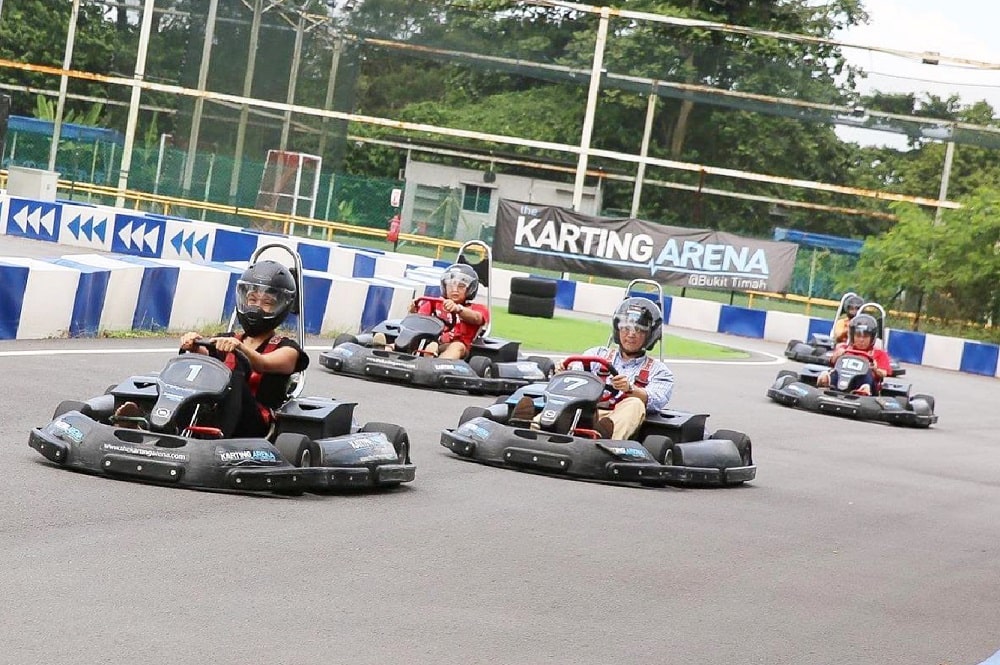 A line of up of electric go-karts on the race track